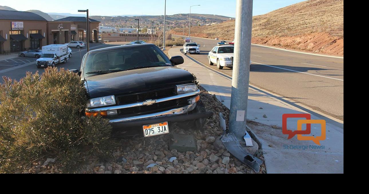 Driver arrested after crashing truck into light pole with child in the ...