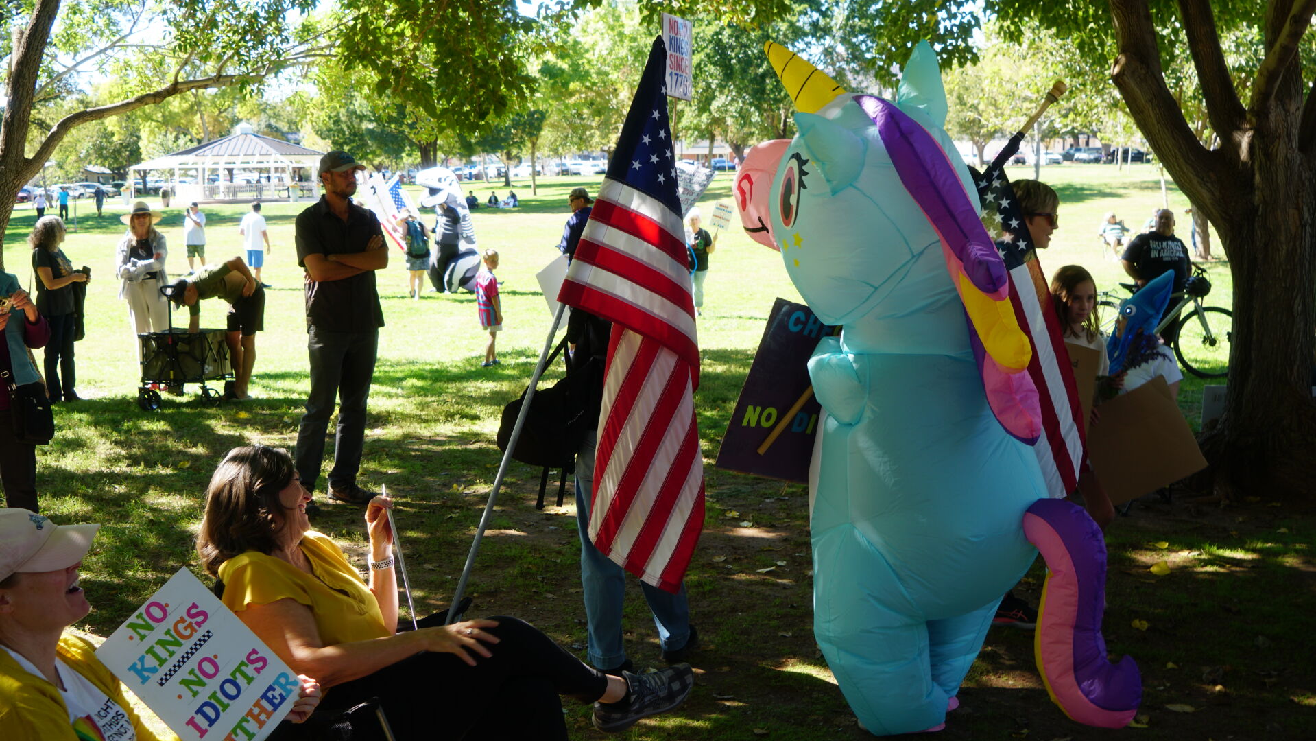 Inflatable animal costumes hide supportive message at No Kings rally in ...