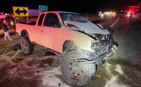 Damaged Toyota and Dodge pickup trucks after a two-vehicle crash in Iron County, Utah.