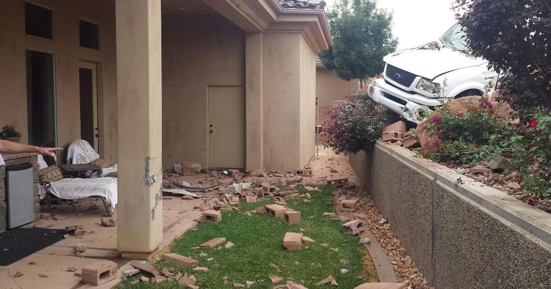 70-year-old man taken to hospital after crashing through block wall ...