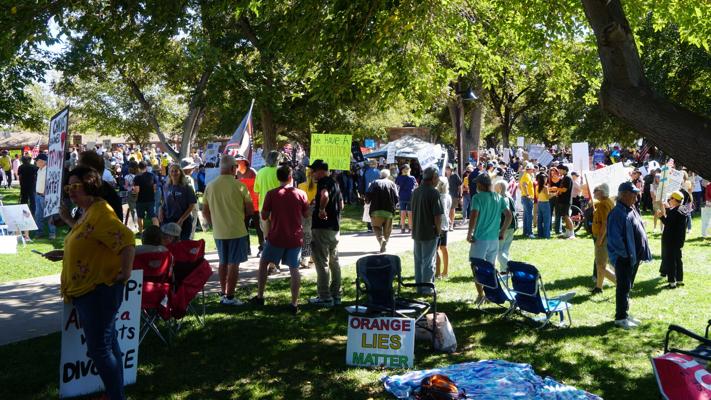 Inflatable animal costumes hide supportive message at No Kings rally in ...