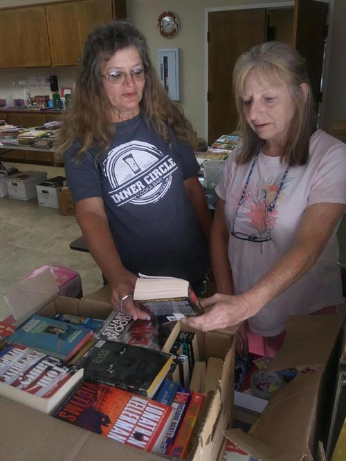 Local residents score big in Friends of the Library book sale