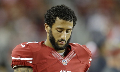 Nfl Star Colin Kaepernick Sits In Protest During National