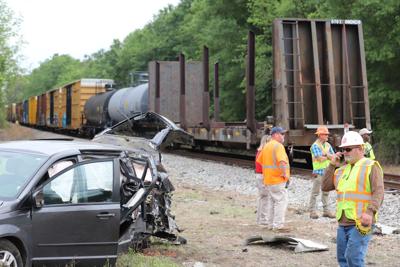 Injuries reported after train collides with Dodge minivan