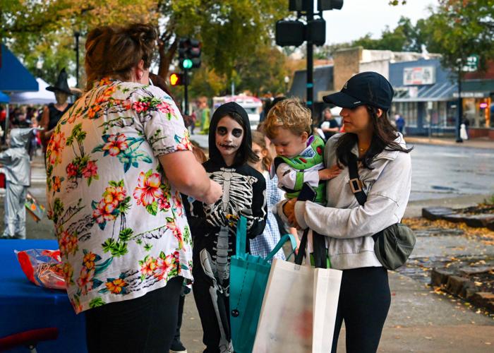 PHOTO GALLERY Families wade through the Downtown Stillwater Halloween