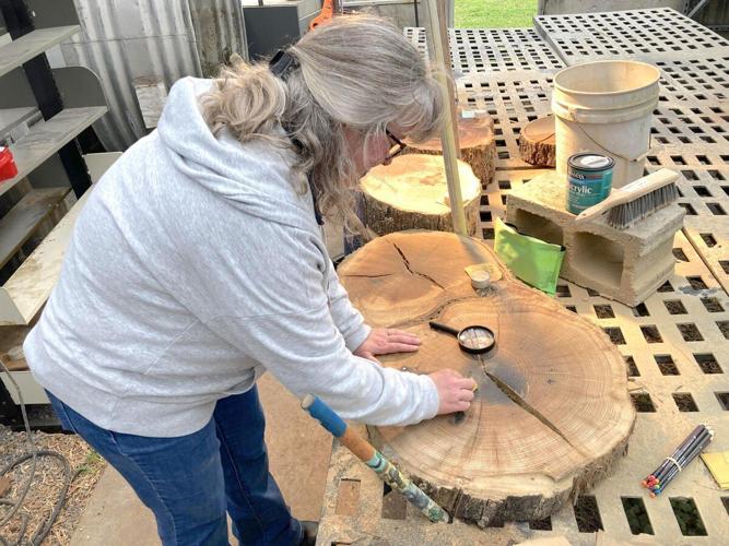 'COOKIE' CUTTERS: As part of Earth Week, NSU patrons learn about special part of tree