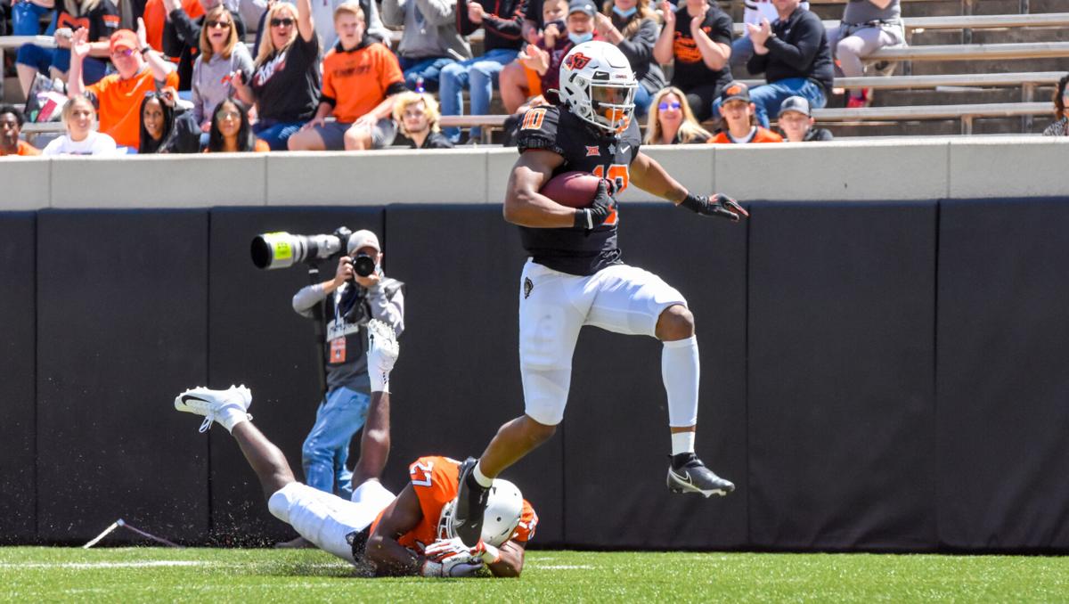 Owens skips into endzone.jpg