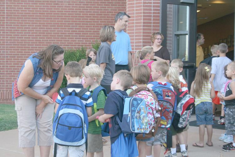 They're back in school; Summer ends for MulhallOrlando students