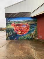 Arts community in Northeastern Oklahoma city cries foul as downtown mural covered by garish paint