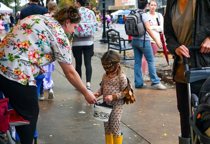 PHOTO GALLERY Families wade through the Downtown Stillwater Halloween
