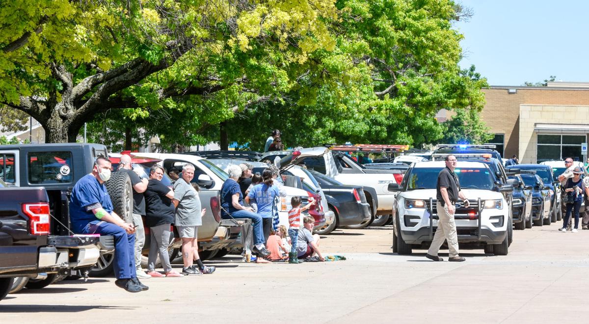 SMC people by cars.jpg