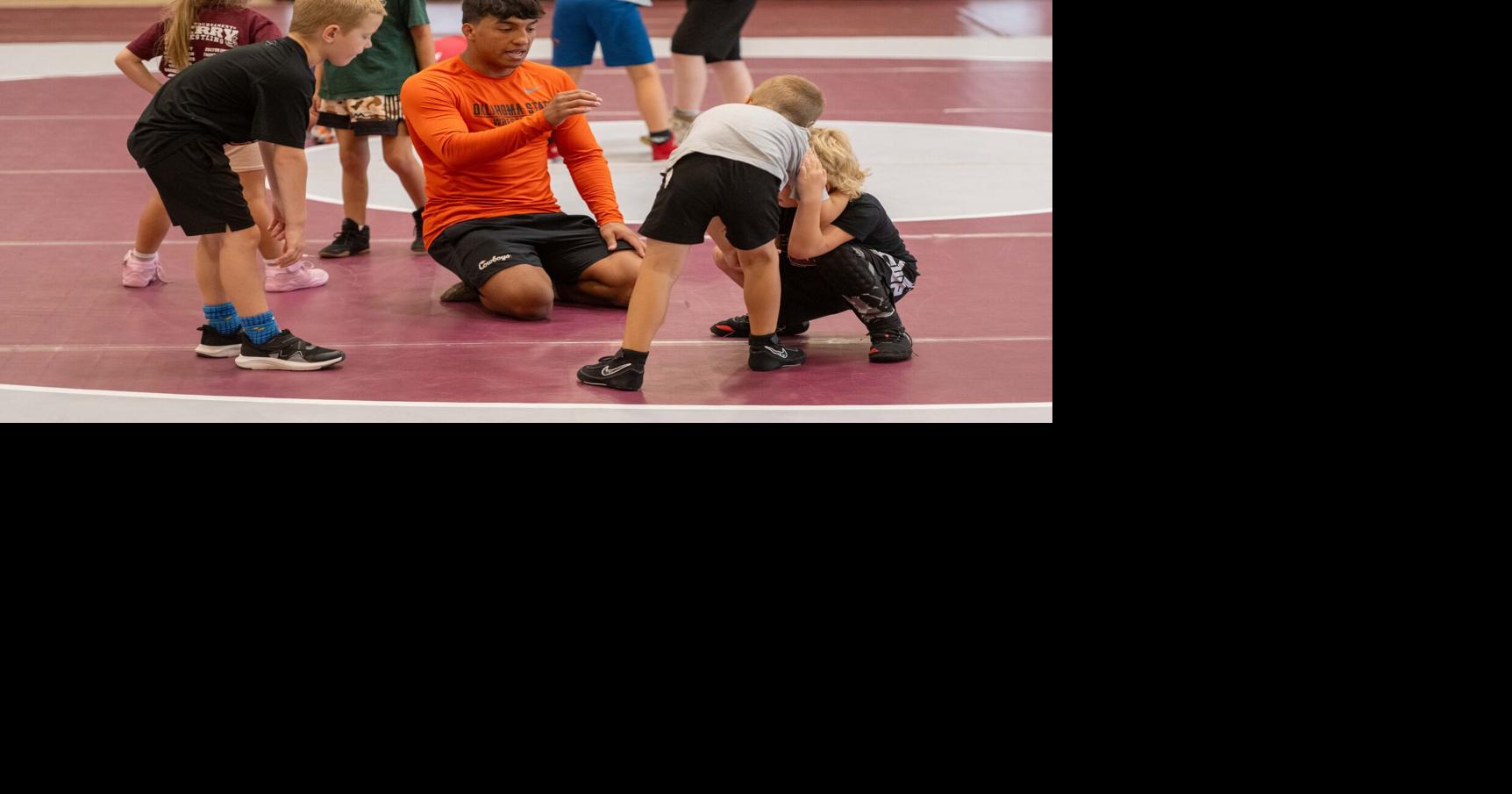 Perry wrestling hosts camp with David Taylor, Oklahoma State wrestlers