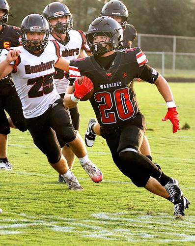 Musch, Belden push Bombers past Warriors, 33-14
