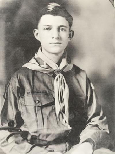Boy Scout wearing the uniform introduced in 1922