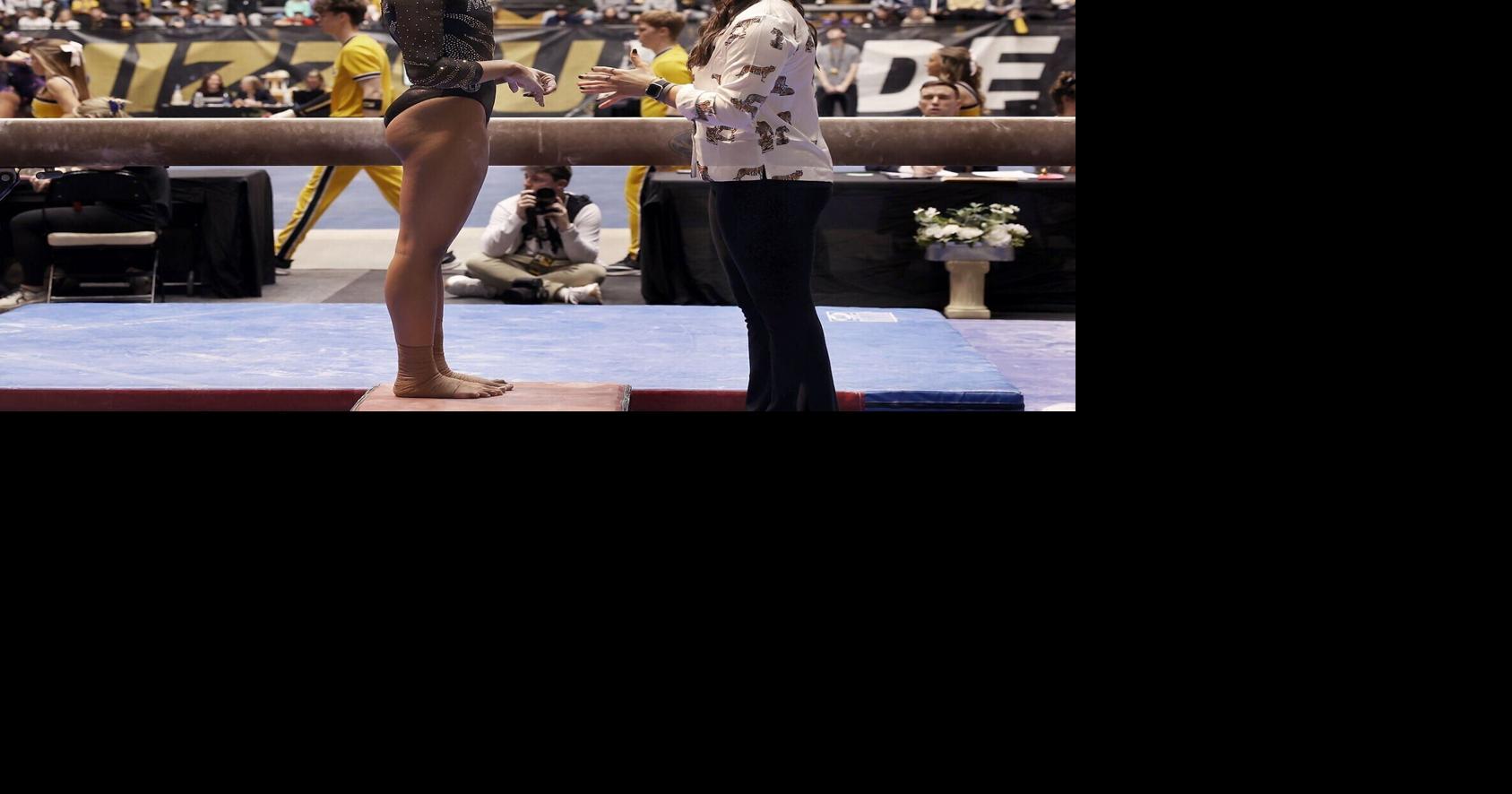 Mizzou gymnast Amaya Marshall talks with her coach Lacey Rubin before her (copy)