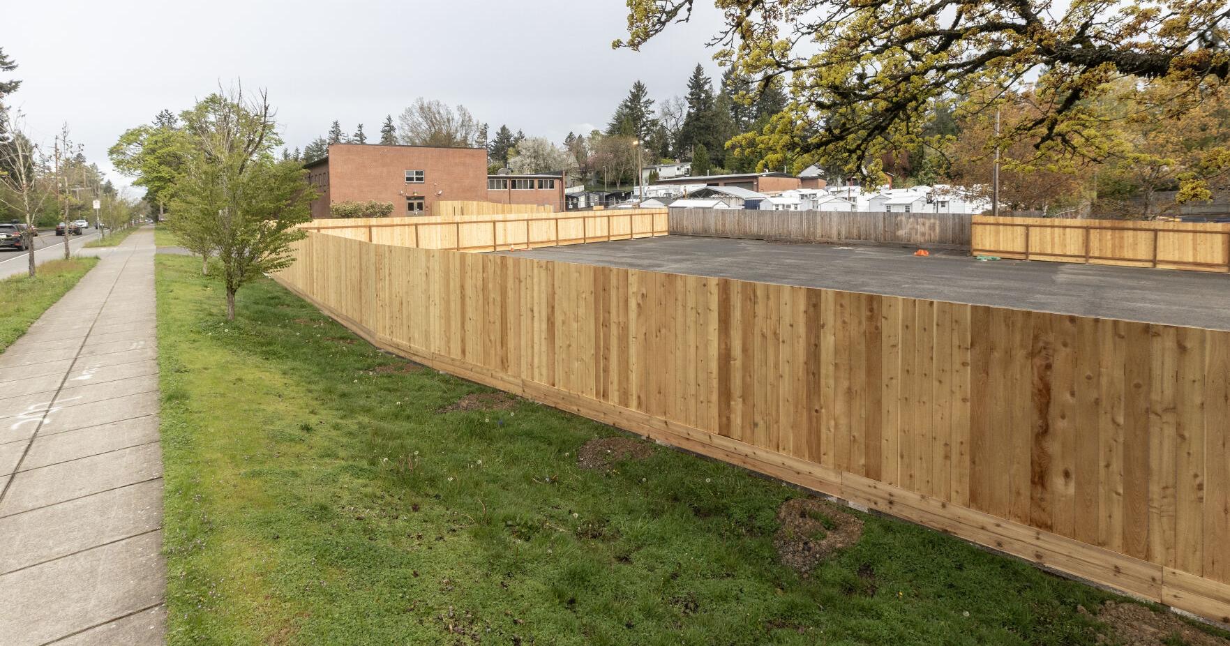 New fence, Sears Armory part of expanded Multnomah Safe Rest Village