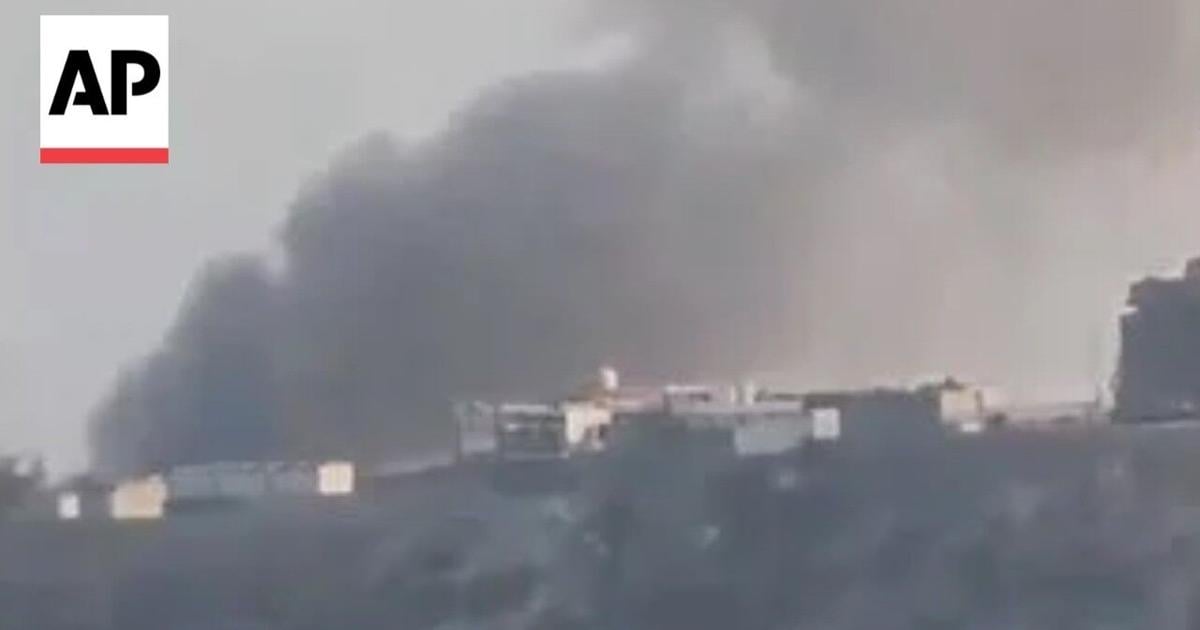 Video shows smoke rising near a palace used by Yemen's government