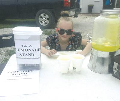 Tatum May and her lemonade stand