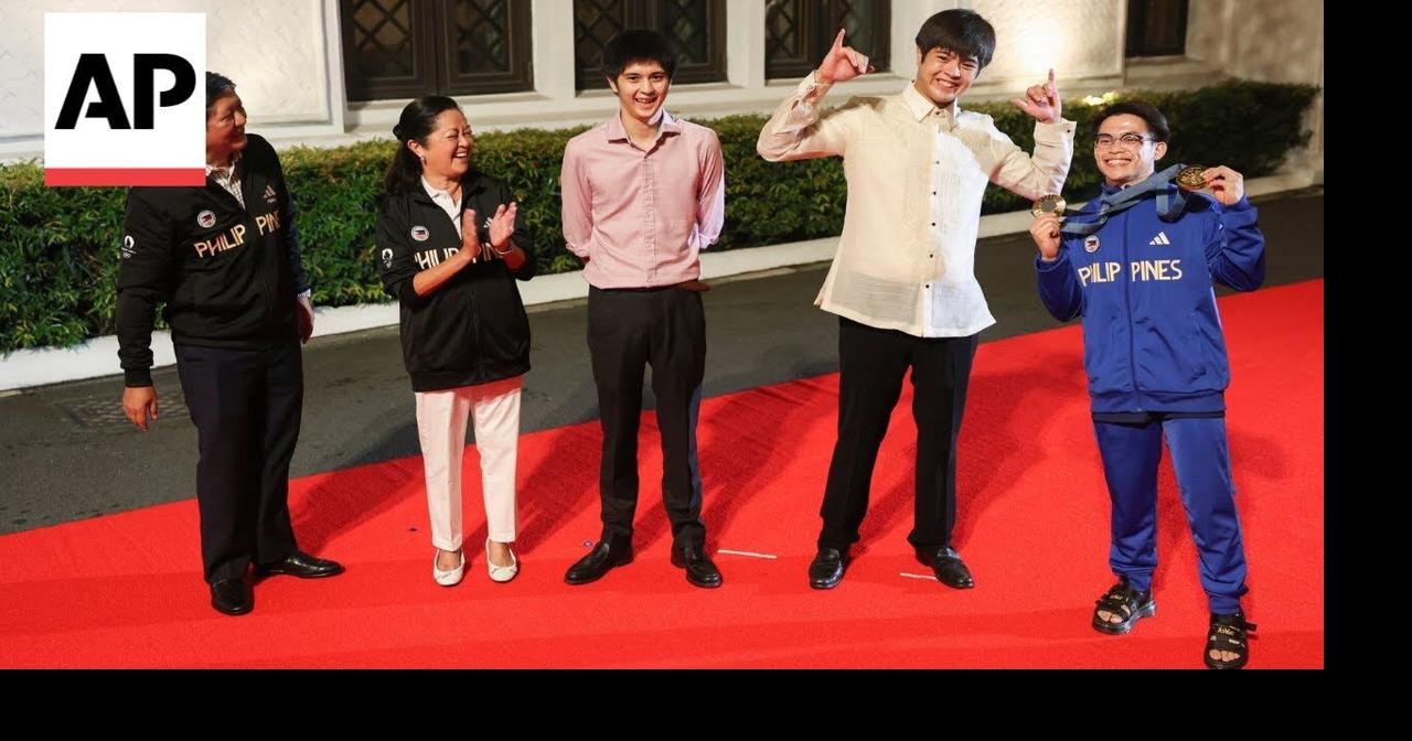 Philippines' Olympic gold medallist Carlos Yulo arrives in Manila to a