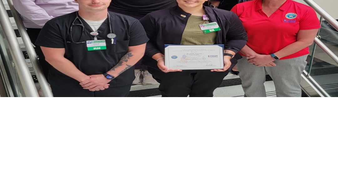 Cass Health RN and National Guard Member presents Patriot Award