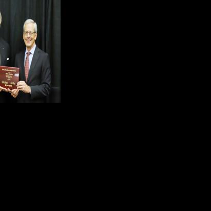 Guttau honored by Iowa Bankers Association for 50 years of service