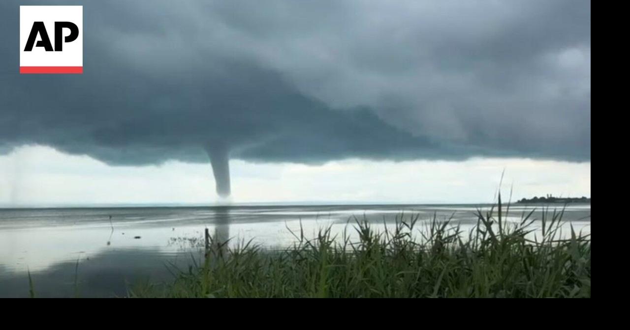 Waterspout forms over a lake in Germany in rare weather event ...