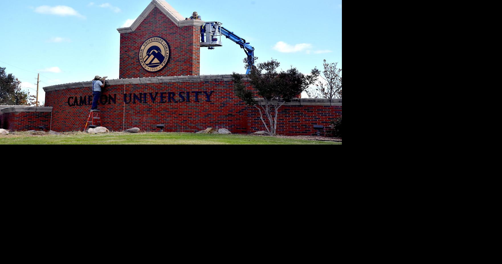 Putting up Christmas lights at Cameron University