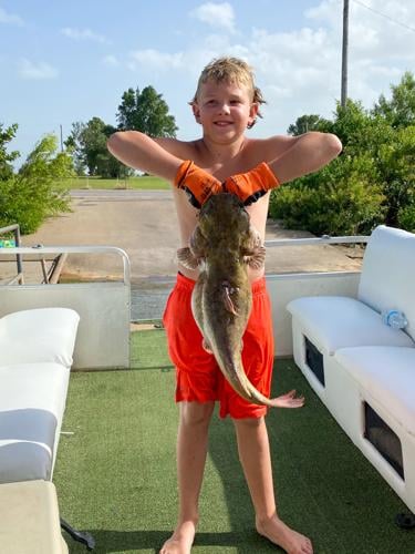 Mac Middle student hauls huge catfish while noodling at Ellsworth