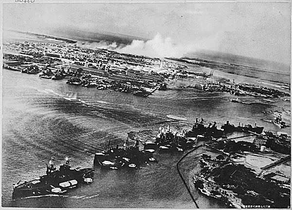 Smoke rises over Hickam Field after Pearl Harbor attack