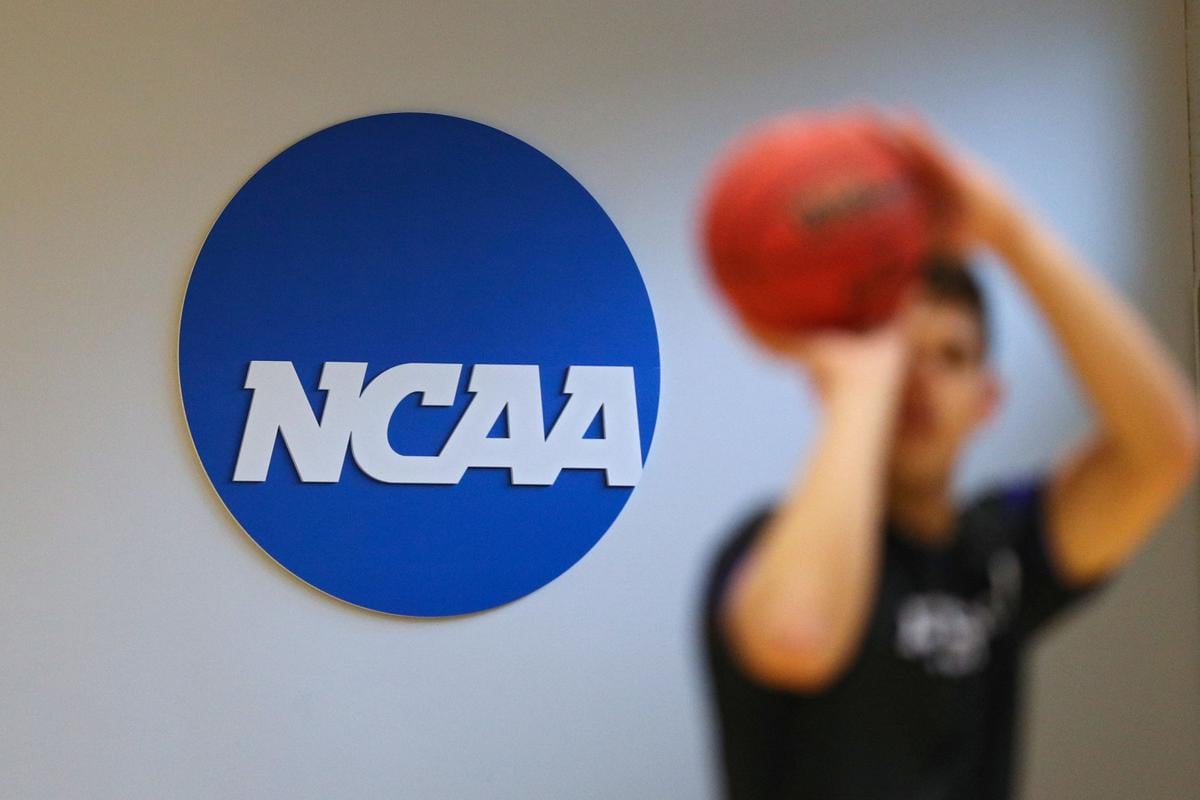 A NCAA logo on the wall as Yeshiva players warmup prior to playing against Worcester Polytechnic Institute during the NCAA Division III Men's Basketball Championship - First Round on March 6, 2020 at Goldfarb Gymnasium at Johns Hopkins University in Baltimore, Md.