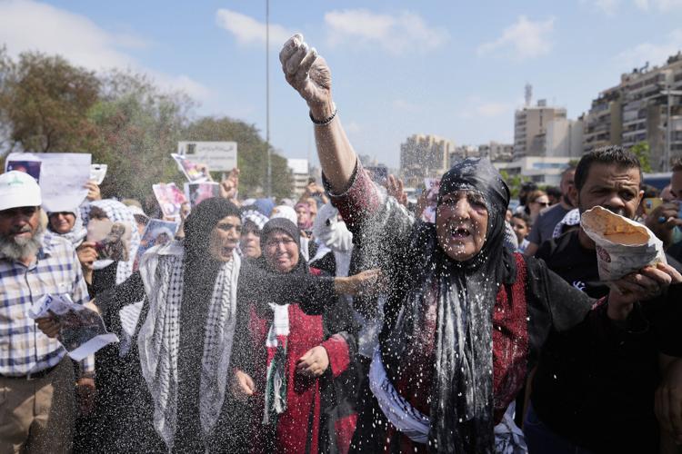 The Latest: Israel is pushing Gaza into starvation, aid groups say