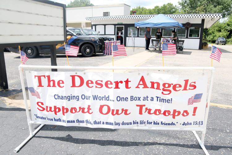 Desert Angels packing Miracle Boxes, News for Fenton, Linden, Holly MI