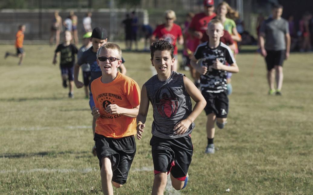 Orange Runners club still running strong after 14 years Sports