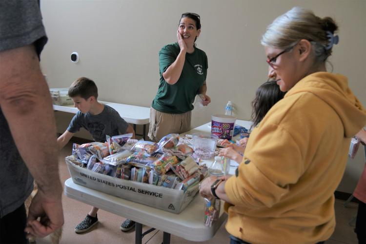 Desert Angels packing Miracle Boxes, News for Fenton, Linden, Holly MI