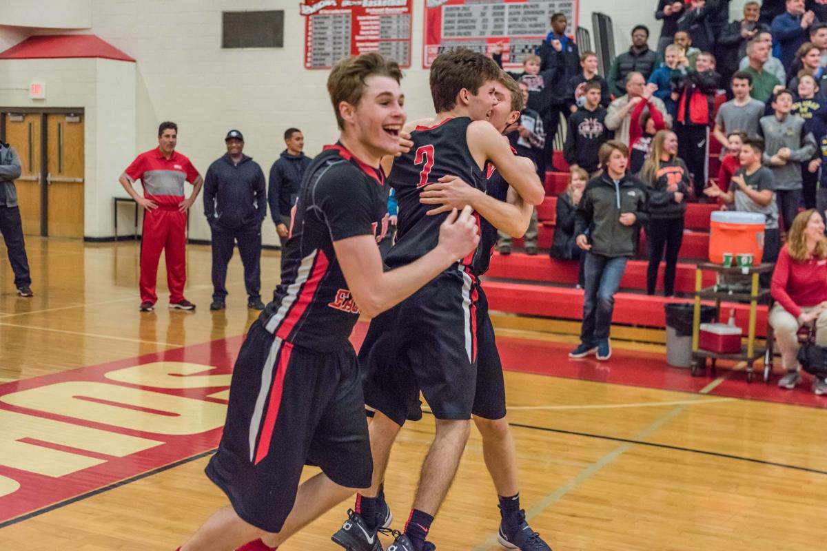 Eagles Work Overtime To Capture First Boys Basketball District