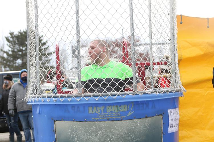 Teachers brave the dunk tank on Disability Awareness Day to raise money for  senior heading for the Special Olympics World Games – AAPS District News