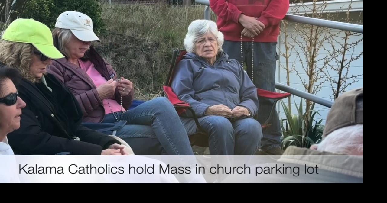 Locked-out Kalama Catholics hold parking lot Mass