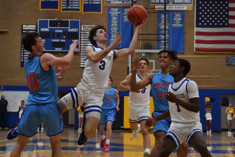 3A/2A High School Boys Basketball Kelso outmuscles Mark Morris to