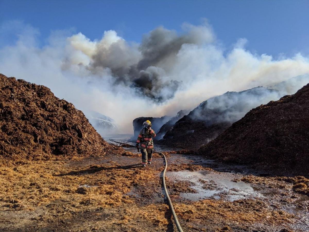 Swanson wood piles burn