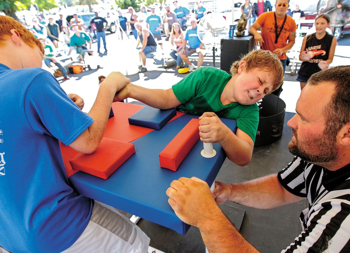 Kids arm wrestle for glory at Highlander Festival