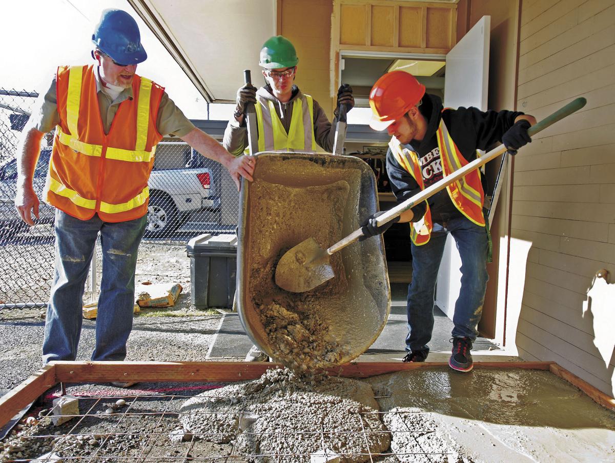 Longview couple teaches teens to build wheelchair ramps for the needy