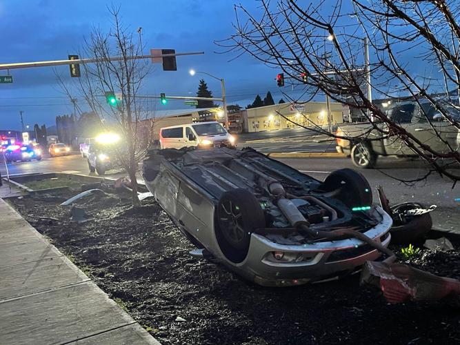 Driver walks away after car flips on Tennant Way in Longview