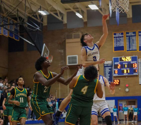 3A High School Boys Basketball Kelso runs past Evergreen for league title