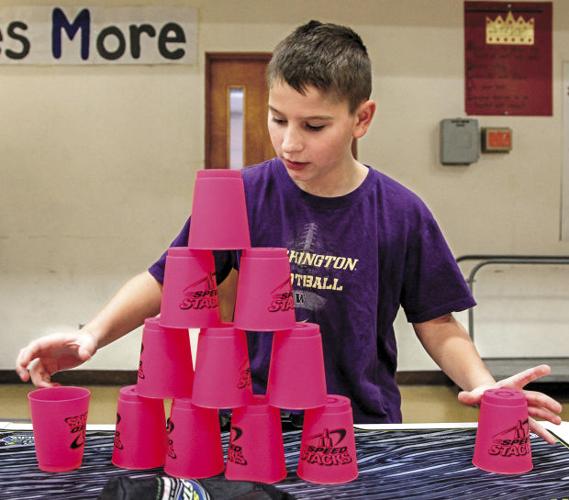 Local students go for Guiness world record for cup stacking
