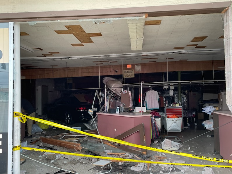 Car hits Longview dry cleaners Thursday