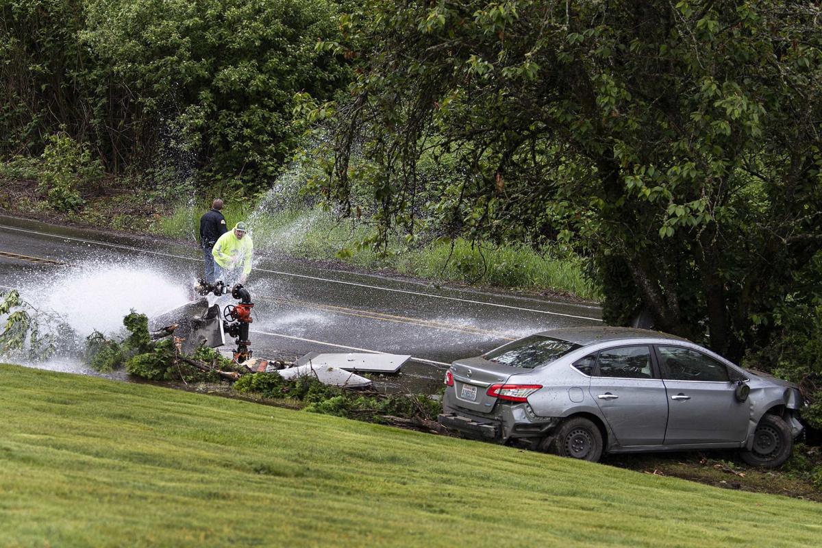 Valves gushes water onto Mount Solo Road