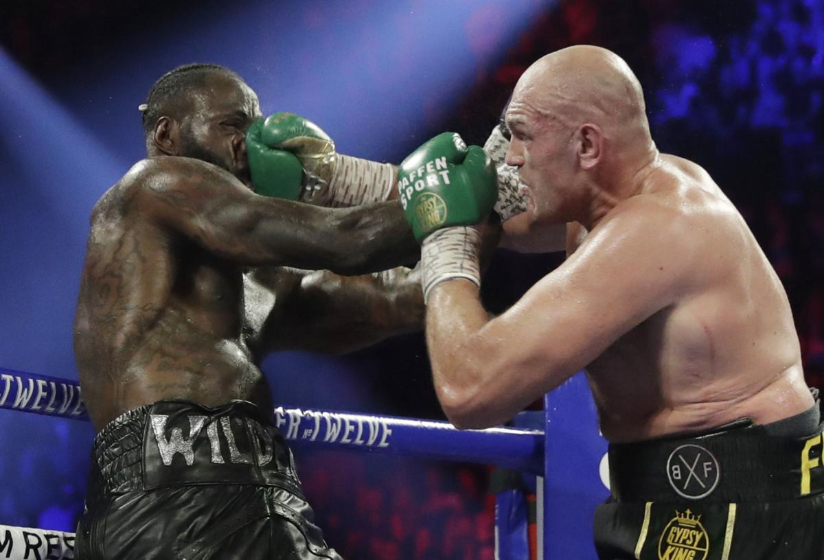 APTOPIX Fury Wilder Boxing