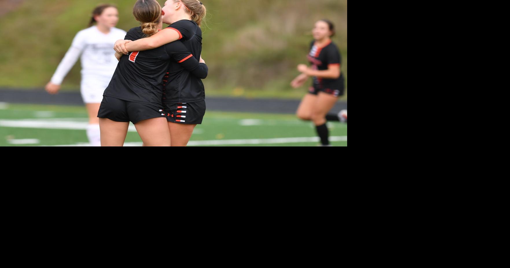 Kalama girls soccer goal hug.JPG