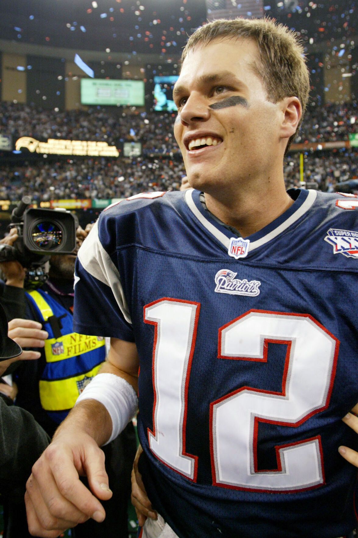 In this Dec. 2, 2018, file photo, New England Patriots quarterback Tom Brady  celebrates a touchdown during an NFL football game against the Minnesota  Vikings at Gillette Stadium in Foxborough, Mas …