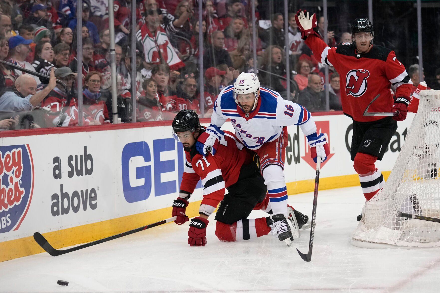 Rangers cruise past Devils in opener